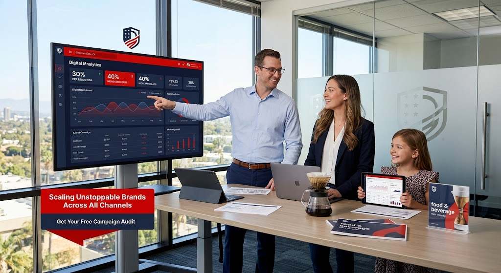 Dalby Company team presenting a digital advertising analytics dashboard to a client, with branded campaign signage on the desk